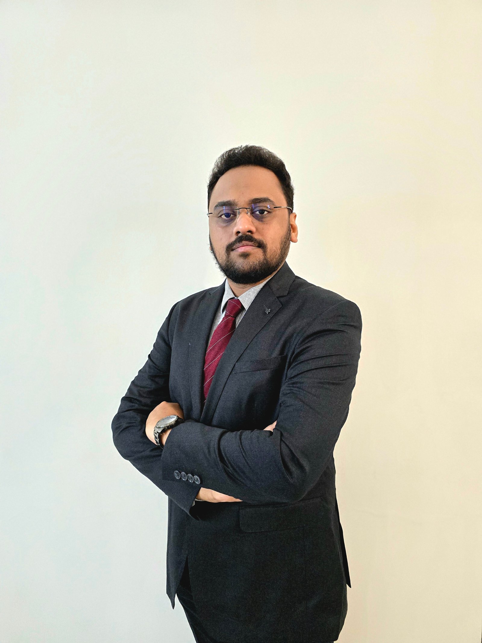 Dr. Alister Victor - Surgical Gastroenterologist and GI Oncology Specialist in professional medical attire